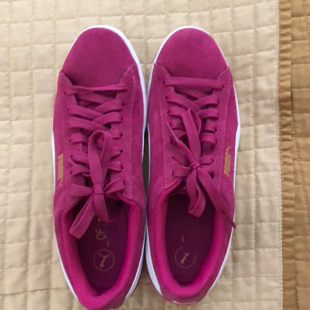 Hot pink puma sneakers